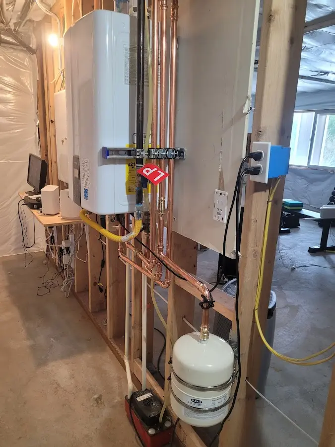 Licensed plumber repairing a kitchen sink in Severna Park
